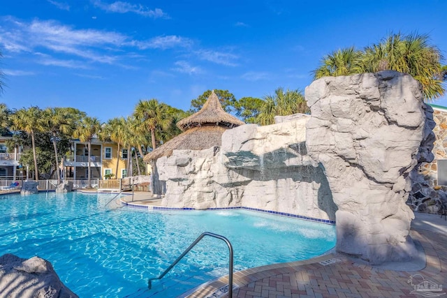 view of pool featuring pool water feature