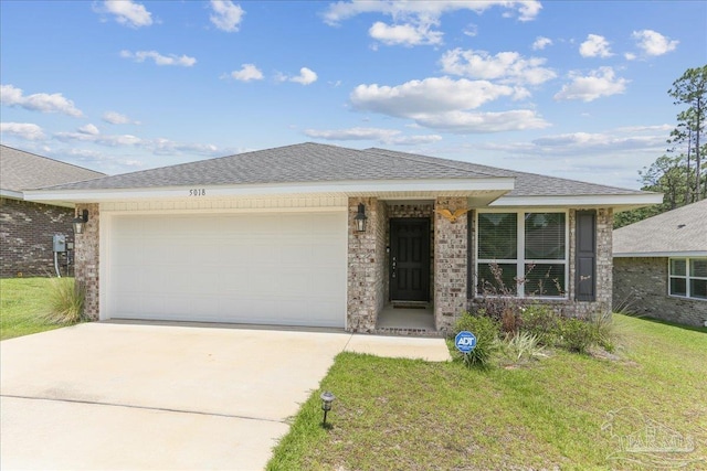 5018 Quarter Deck St, Pensacola, FL 32526 - single story home with driveway, a garage, a shingled roof, and a front lawn