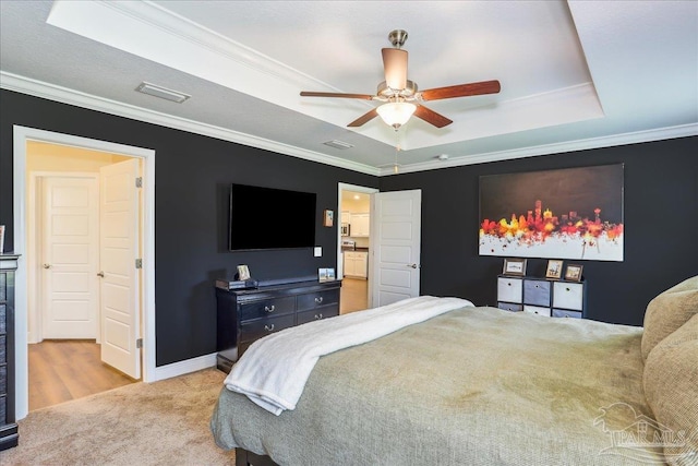 5018 Quarter Deck St, Pensacola, FL 32526 - bedroom with a tray ceiling, ornamental molding, carpet flooring, a ceiling fan, and baseboards