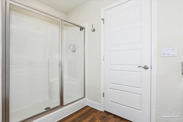 5018 Quarter Deck St, Pensacola, FL 32526 - bathroom with a shower stall, wood finished floors, and baseboards
