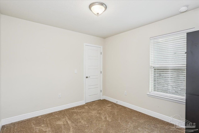 5018 Quarter Deck St, Pensacola, FL 32526 - spare room with carpet, baseboards, and a smoke detector