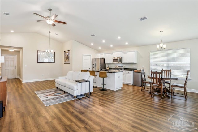 5018 Quarter Deck St, Pensacola, FL 32526 - living area featuring a chandelier, lofted ceiling, baseboards, a ceiling fan, and dark wood-style floors