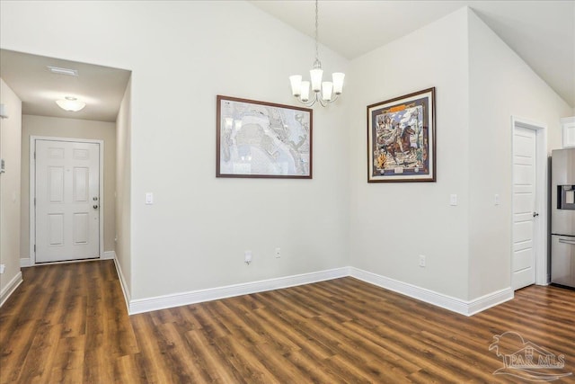 5018 Quarter Deck St, Pensacola, FL 32526 - unfurnished dining area featuring dark wood-style floors, baseboards, a chandelier, and vaulted ceiling