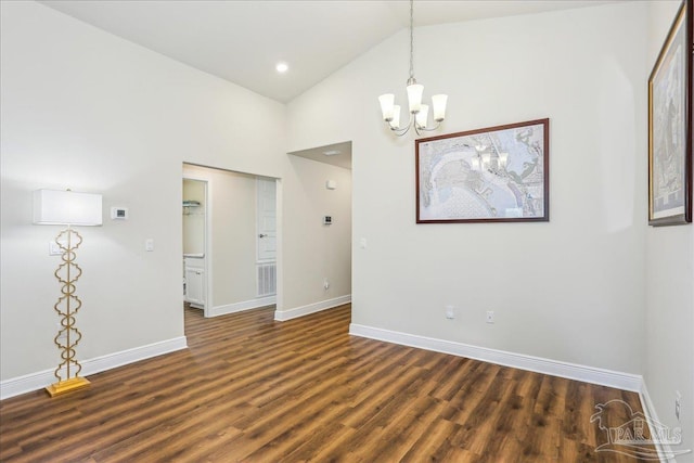 5018 Quarter Deck St, Pensacola, FL 32526 - spare room featuring baseboards, a chandelier, wood finished floors, and high vaulted ceiling