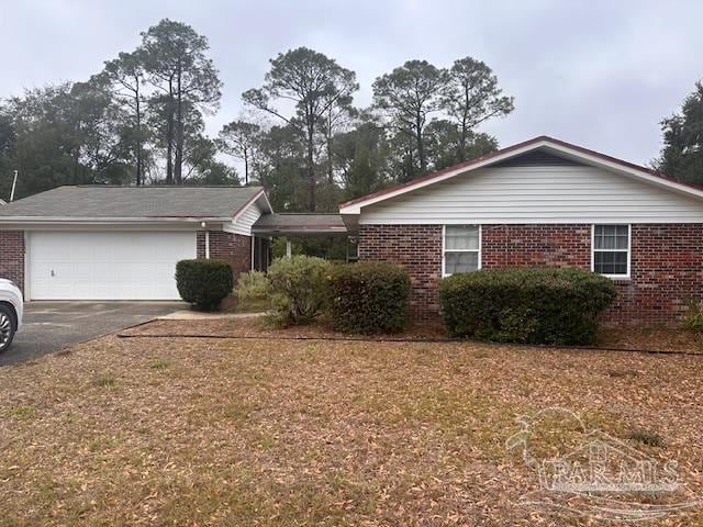 view of side of home featuring a garage