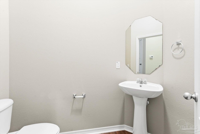 bathroom featuring toilet