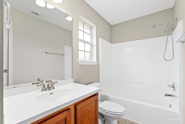 full bathroom with vanity, a textured ceiling, shower / tub combination, and toilet