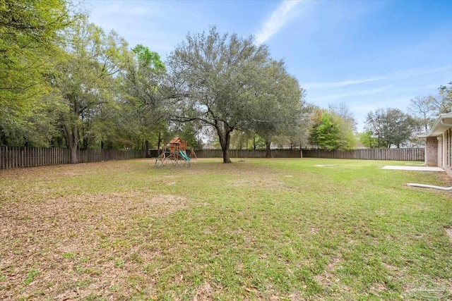 view of yard with a playground