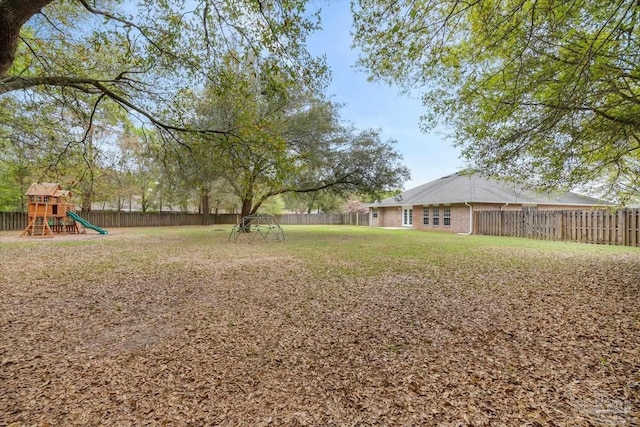 view of yard featuring a playground