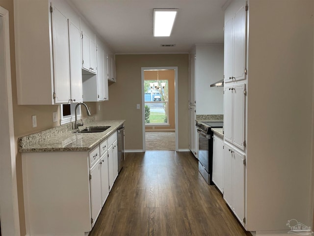 kitchen with appliances with stainless steel finishes, dark hardwood / wood-style flooring, sink, white cabinets, and range hood