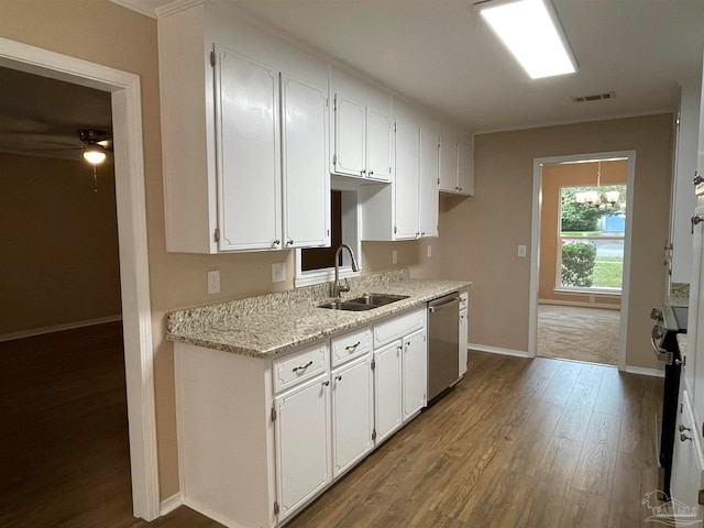 kitchen with white cabinets, wood-type flooring, dishwasher, and sink