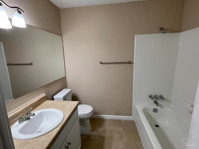 full bathroom featuring tile patterned flooring, vanity, toilet, and tub / shower combination