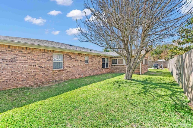 view of yard featuring a fenced backyard