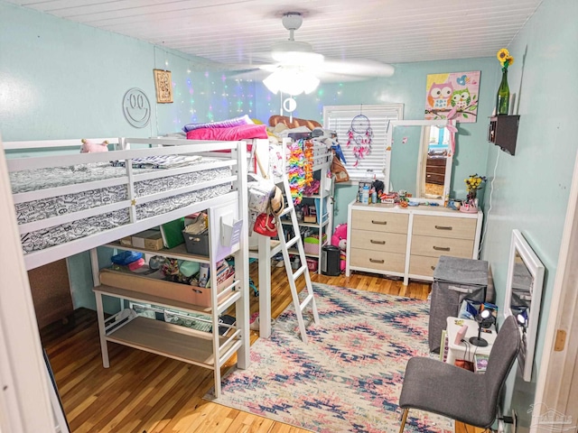 bedroom featuring wood finished floors