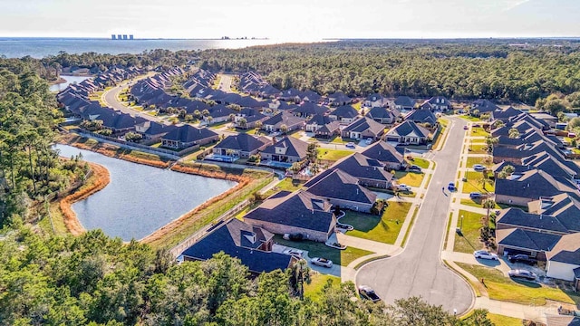 aerial view with a water view and a residential view