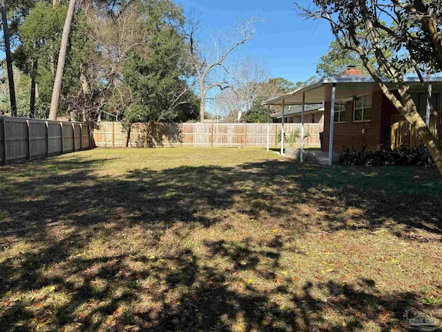 view of yard featuring a fenced backyard