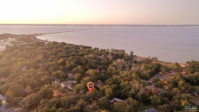 aerial view at dusk with a water view