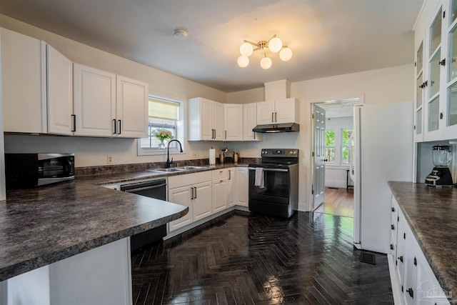 kitchen with white cabinetry, black range with electric stovetop, sink, and a healthy amount of sunlight