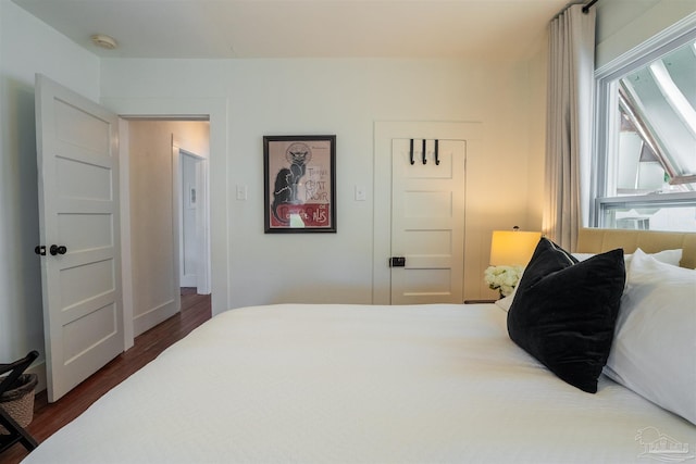 bedroom featuring dark hardwood / wood-style floors