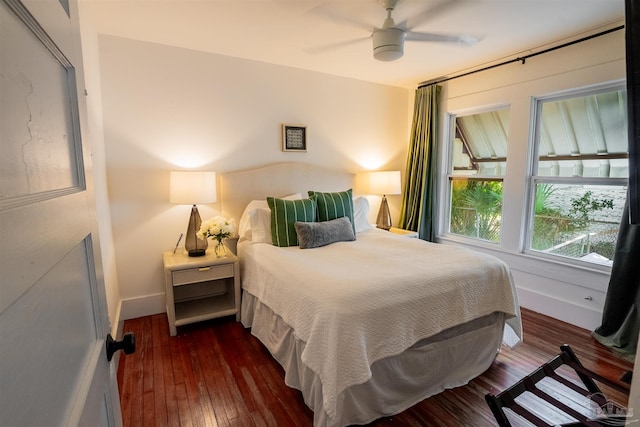 bedroom featuring dark hardwood / wood-style floors and ceiling fan