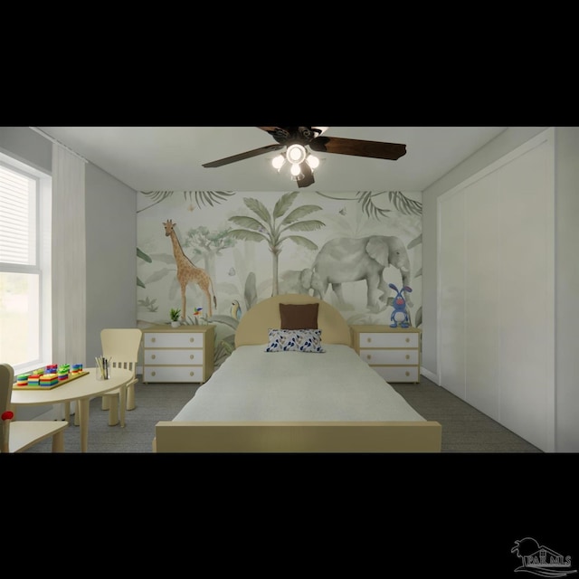 carpeted bedroom featuring a closet and ceiling fan