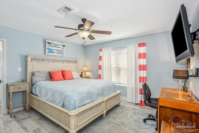 6961 Elliots Gin Ln, Navarre, FL 32566 - bedroom with an office area, a ceiling fan, and baseboards