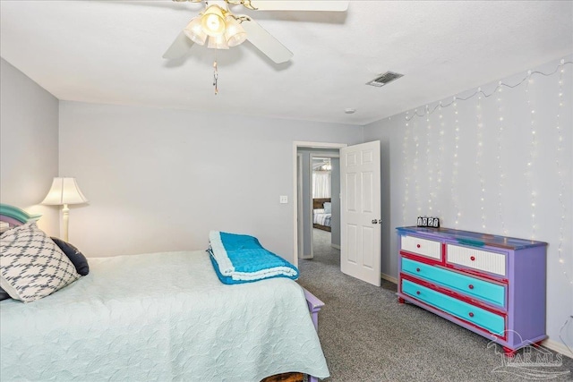 6961 Elliots Gin Ln, Navarre, FL 32566 - carpeted bedroom featuring ceiling fan