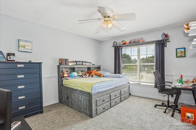 6961 Elliots Gin Ln, Navarre, FL 32566 - bedroom with light carpet, baseboards, and ceiling fan
