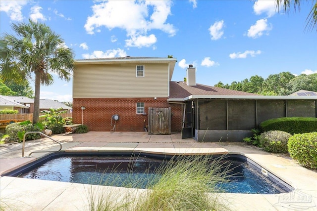 6961 Elliots Gin Ln, Navarre, FL 32566 - view of swimming pool with a patio and a sunroom
