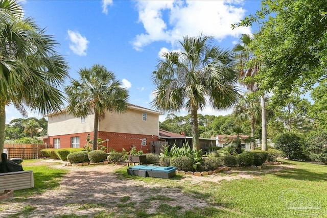 6961 Elliots Gin Ln, Navarre, FL 32566 - view of home's exterior featuring brick siding