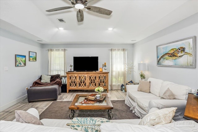 6961 Elliots Gin Ln, Navarre, FL 32566 - living area featuring wood finished floors, a ceiling fan, and baseboards