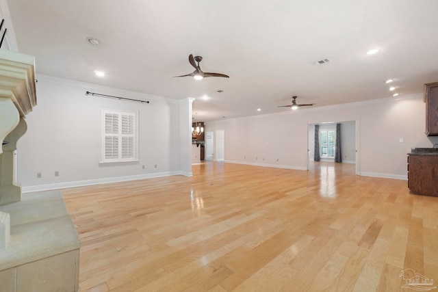 2960 Laurel Dr, Gulf Breeze, FL 32563 - unfurnished living room with a ceiling fan, crown molding, recessed lighting, baseboards, and light wood finished floors