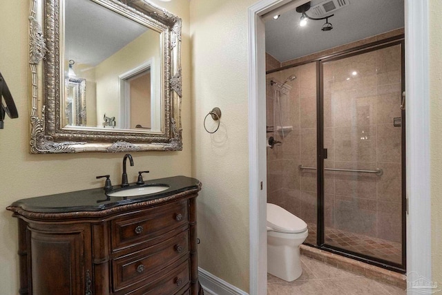 2960 Laurel Dr, Gulf Breeze, FL 32563 - full bath featuring a shower stall, toilet, vanity, and tile patterned flooring