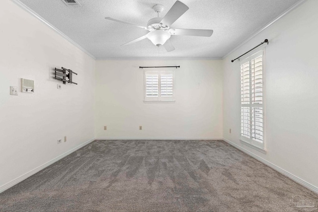2960 Laurel Dr, Gulf Breeze, FL 32563 - empty room featuring a textured ceiling, ceiling fan, carpet, ornamental molding, and baseboards