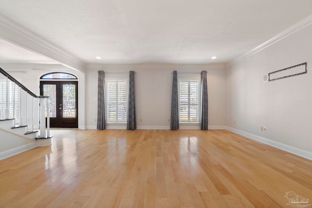 2960 Laurel Dr, Gulf Breeze, FL 32563 - entryway featuring light wood-style floors, stairway, baseboards, crown molding, and recessed lighting