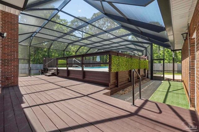 2960 Laurel Dr, Gulf Breeze, FL 32563 - wooden terrace featuring glass enclosure, fence, and an outdoor pool