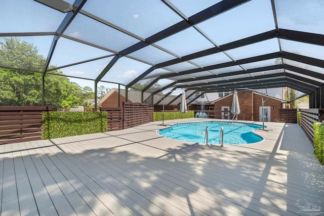 2960 Laurel Dr, Gulf Breeze, FL 32563 - swimming pool with a wooden deck and a lanai