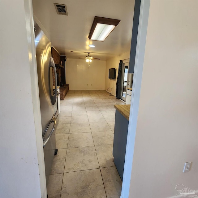 interior space with light tile patterned floors