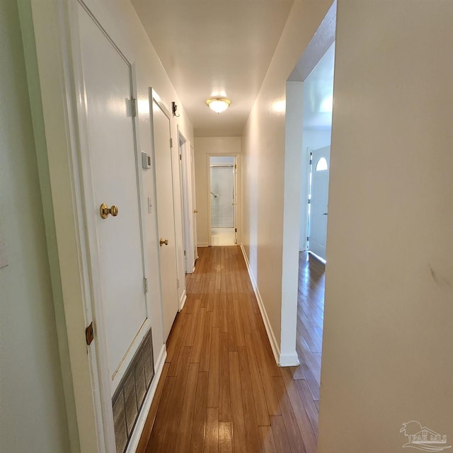 hall featuring light hardwood / wood-style flooring