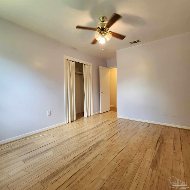 unfurnished bedroom featuring light hardwood / wood-style flooring and ceiling fan