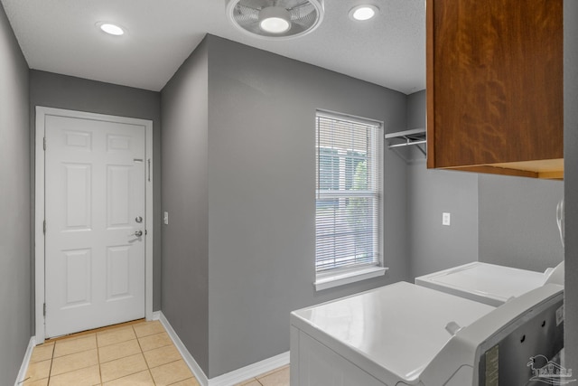 6299 Anderson Ln, Milton, FL 32570 - laundry area with washing machine and clothes dryer, cabinet space, light tile patterned floors, and recessed lighting