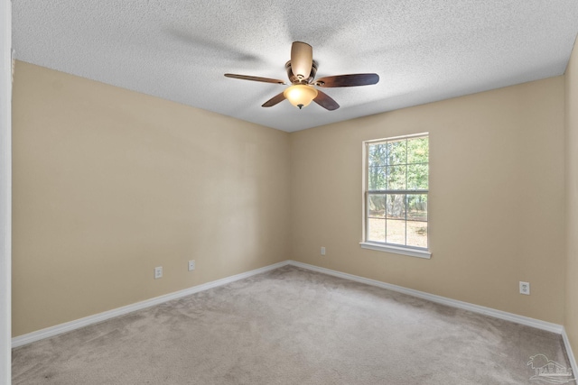 6299 Anderson Ln, Milton, FL 32570 - empty room with ceiling fan, light carpet, and a textured ceiling