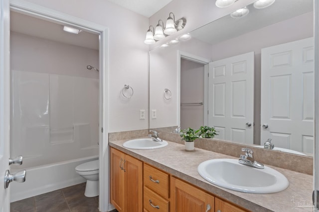 6299 Anderson Ln, Milton, FL 32570 - bathroom featuring double vanity, tile patterned floors, and washtub / shower combination