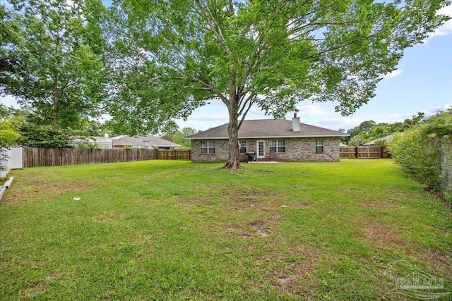 5761 Twisted Oak Ct, Pace, FL 32571 - view of yard featuring a fenced backyard