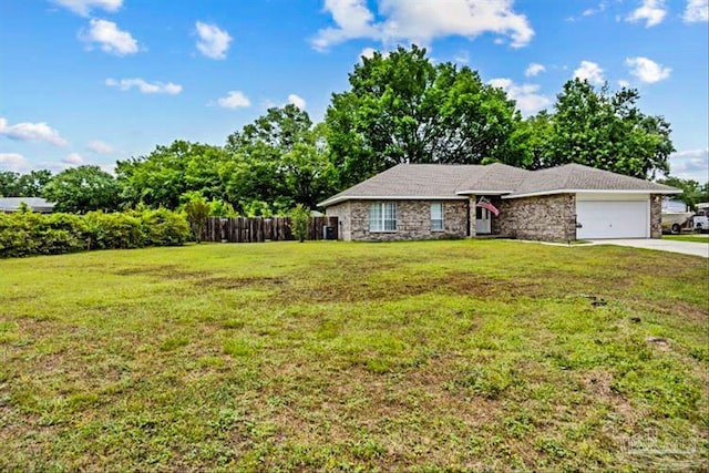 5761 Twisted Oak Ct, Pace, FL 32571 - single story home with an attached garage, driveway, fence, and a front lawn