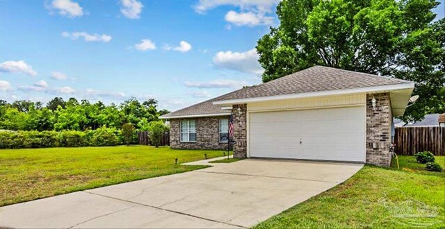 5761 Twisted Oak Ct, Pace, FL 32571 - single story home featuring brick siding, fence, a garage, concrete driveway, and a front yard