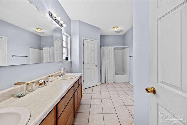 5761 Twisted Oak Ct, Pace, FL 32571 - full bath featuring tile patterned floors, double vanity, a shower with shower curtain, and a sink