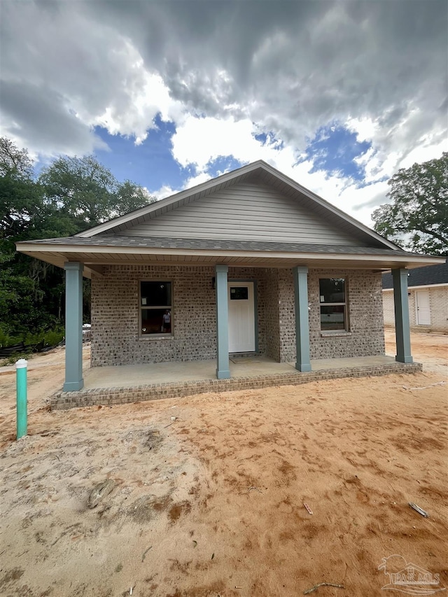 6280 Long St, Milton, FL 32570 - view of front facade featuring a porch and brick siding