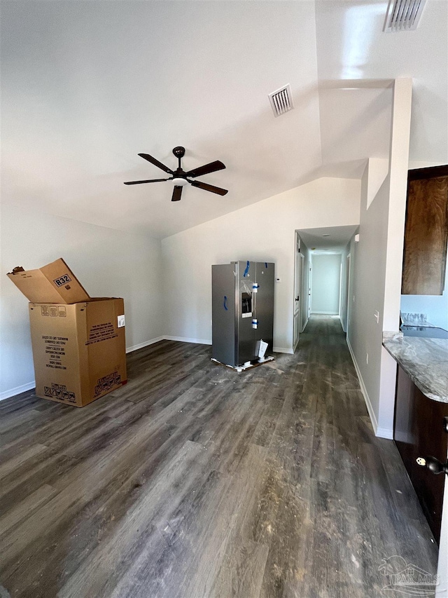 6280 Long St, Milton, FL 32570 - unfurnished living room with vaulted ceiling, dark wood finished floors, and ceiling fan