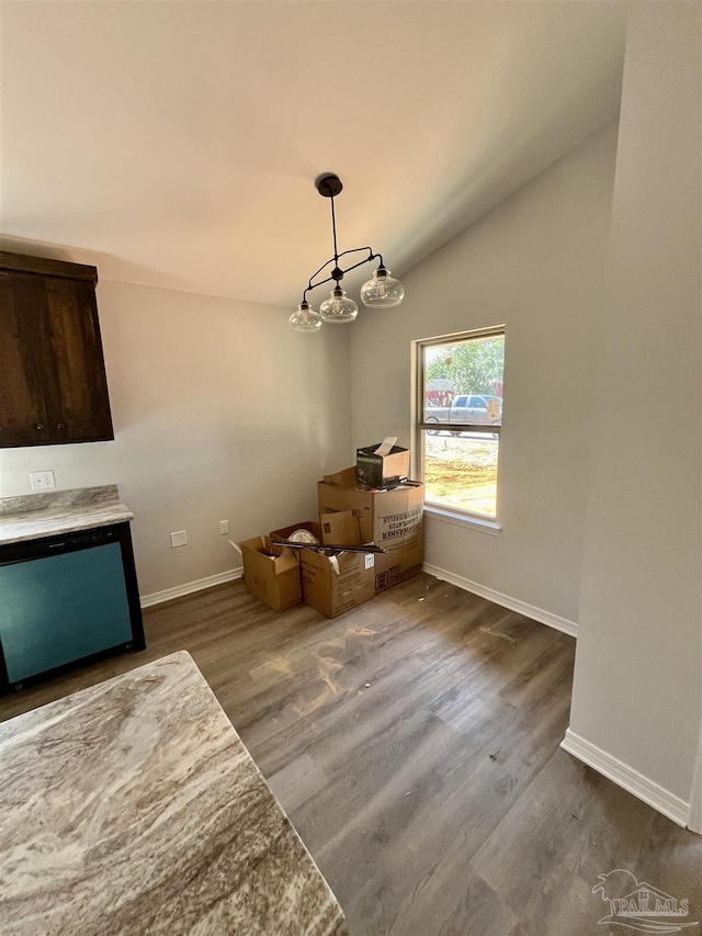 6280 Long St, Milton, FL 32570 - dining room with dark wood-style flooring and lofted ceiling